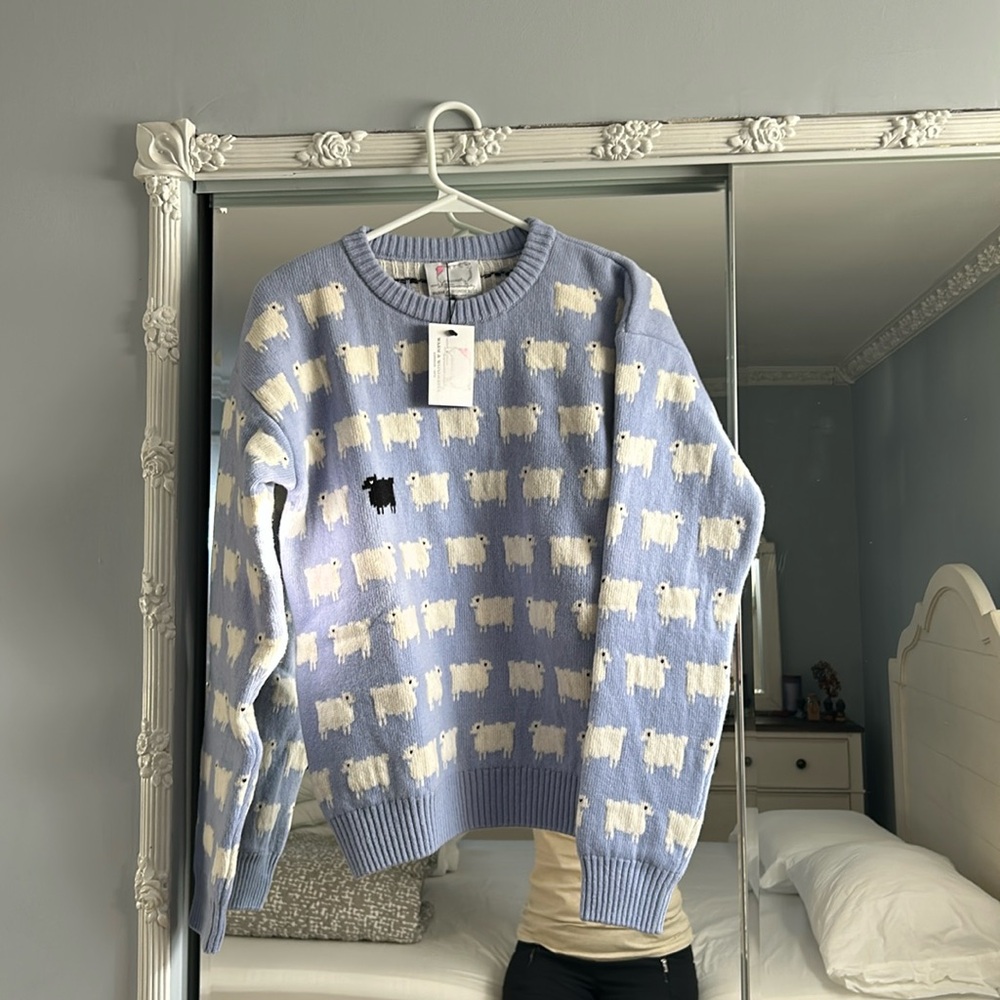Warm and wonderful new sweater. NWT. Size medium.